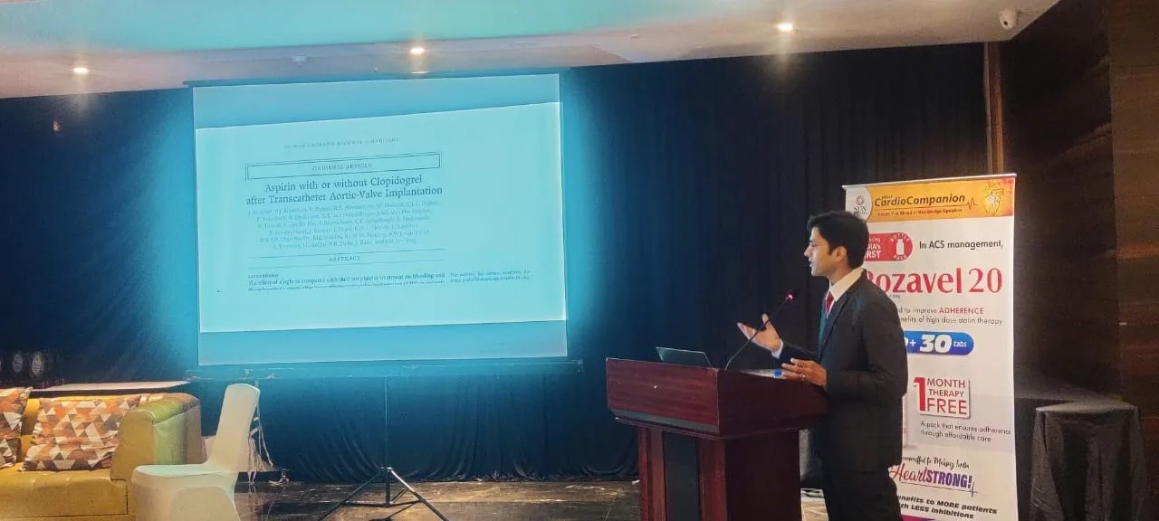 Dr. Gaurav Khandelwal presenting a TAVR research article at a cardiology meeting