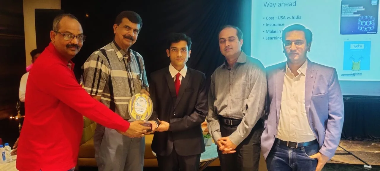 Dr. Gaurav Khandelwal receiving a cardiology recognition plaque