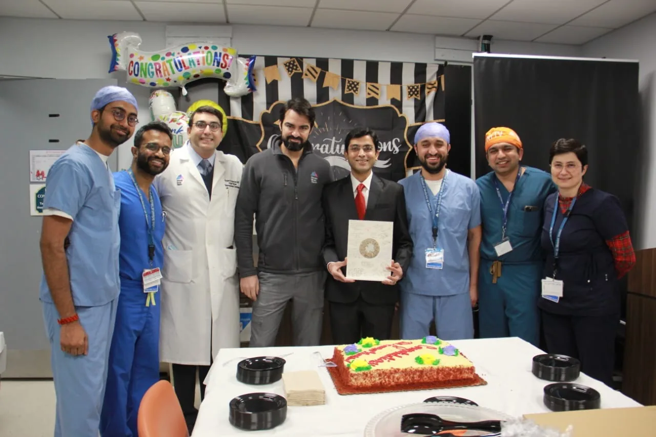 Dr. Gaurav Khandelwal with the Mount Sinai team and appreciation plaque
